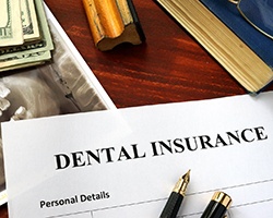 Dental insurance paperwork for the cost of dental emergencies in Carrollton
